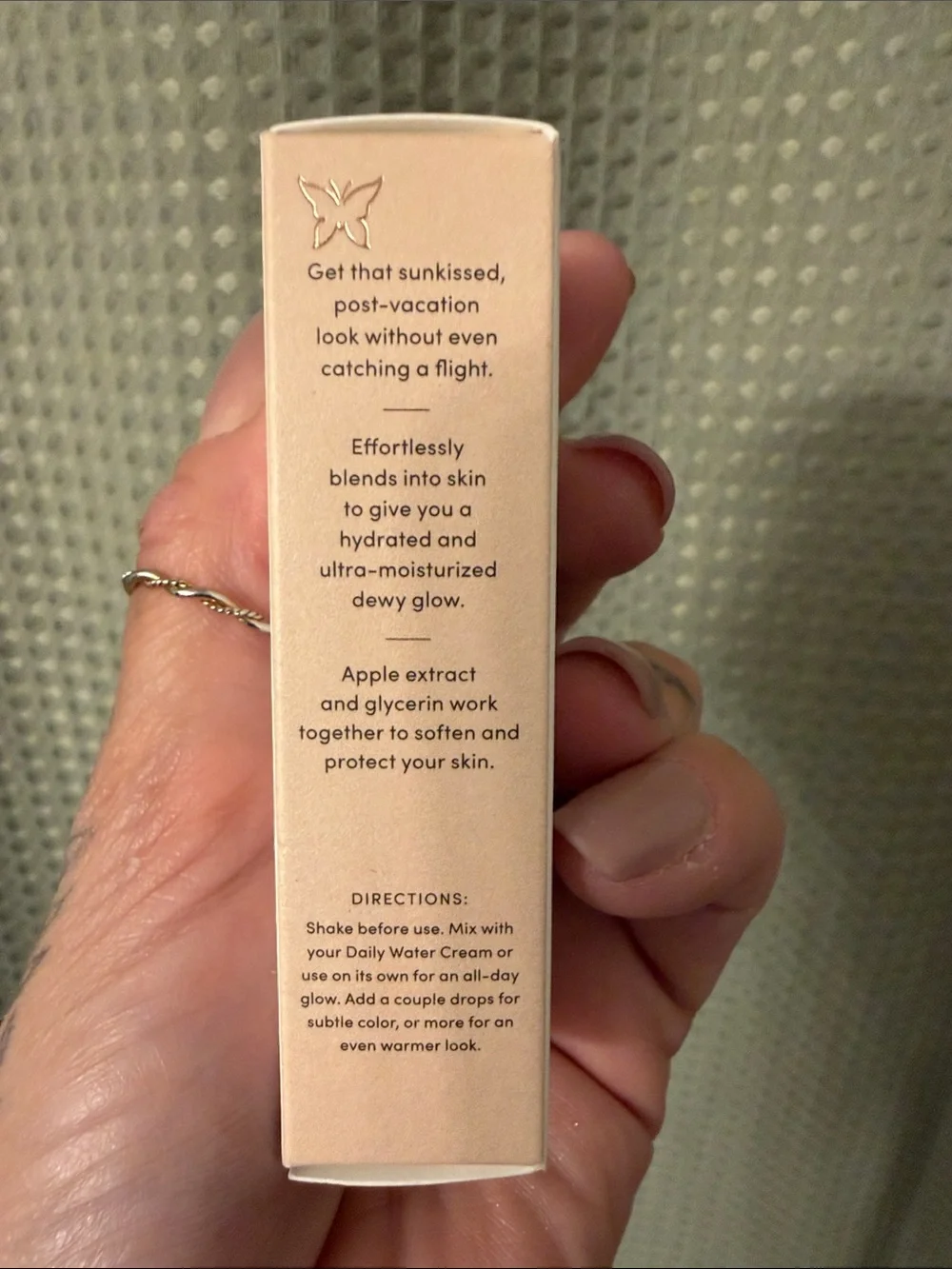 Uncommon Beauty Bronzing Drops — cream white